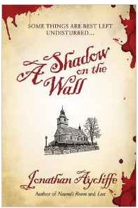 Книга A Shadow on the Wall